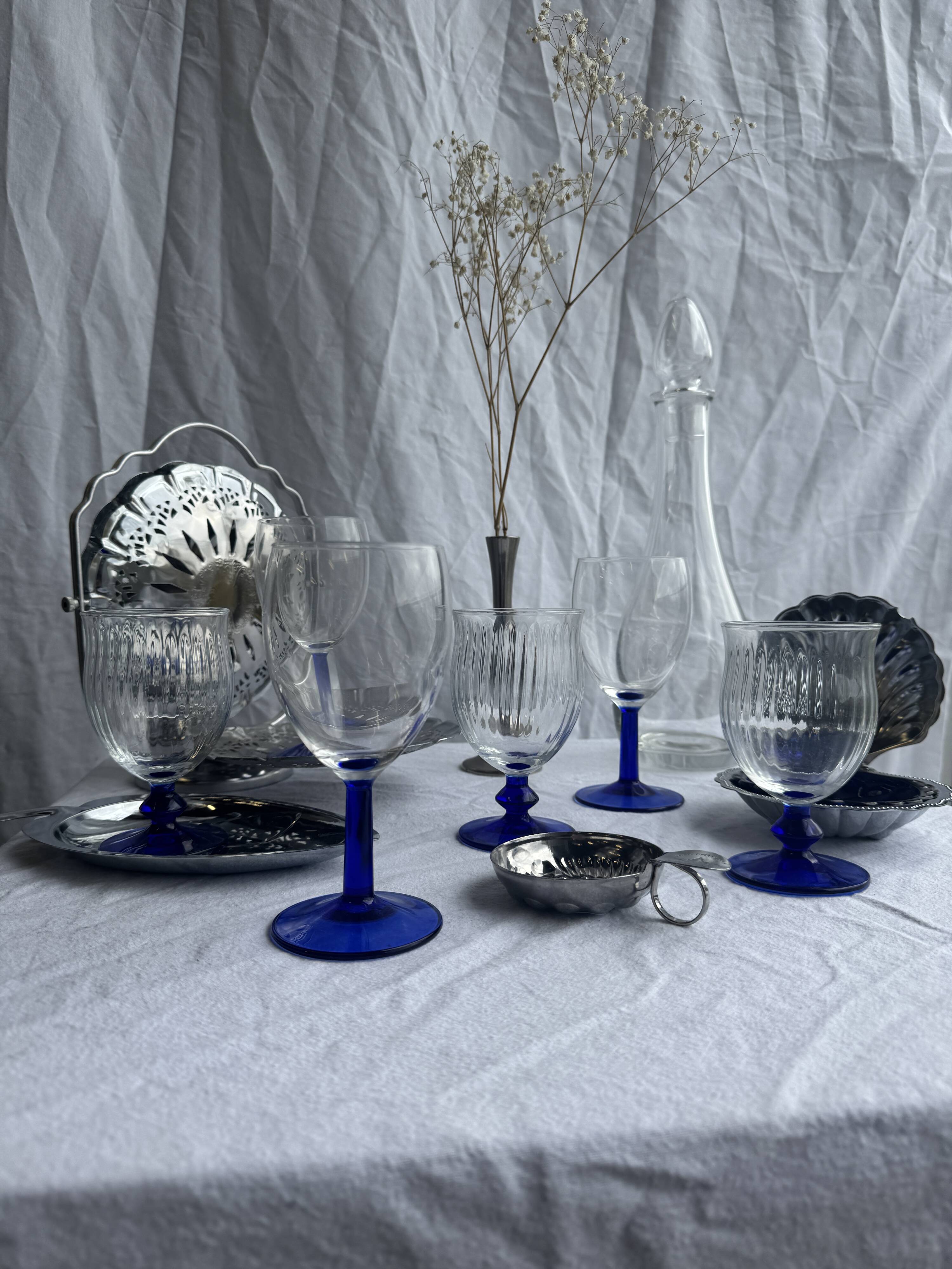 Set of 3 large blue stemmed glasses and 3 small blue stemmed glasses