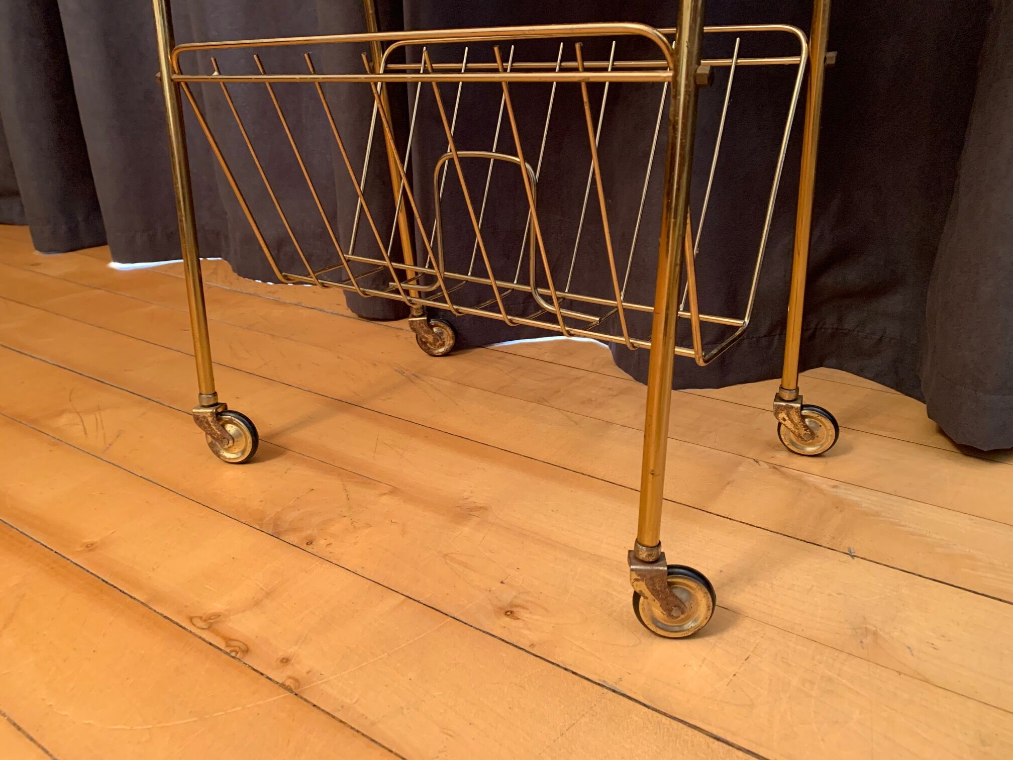 Mobile newspaper holder, 1960s