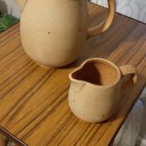 Coffee maker milk jar in sandstone