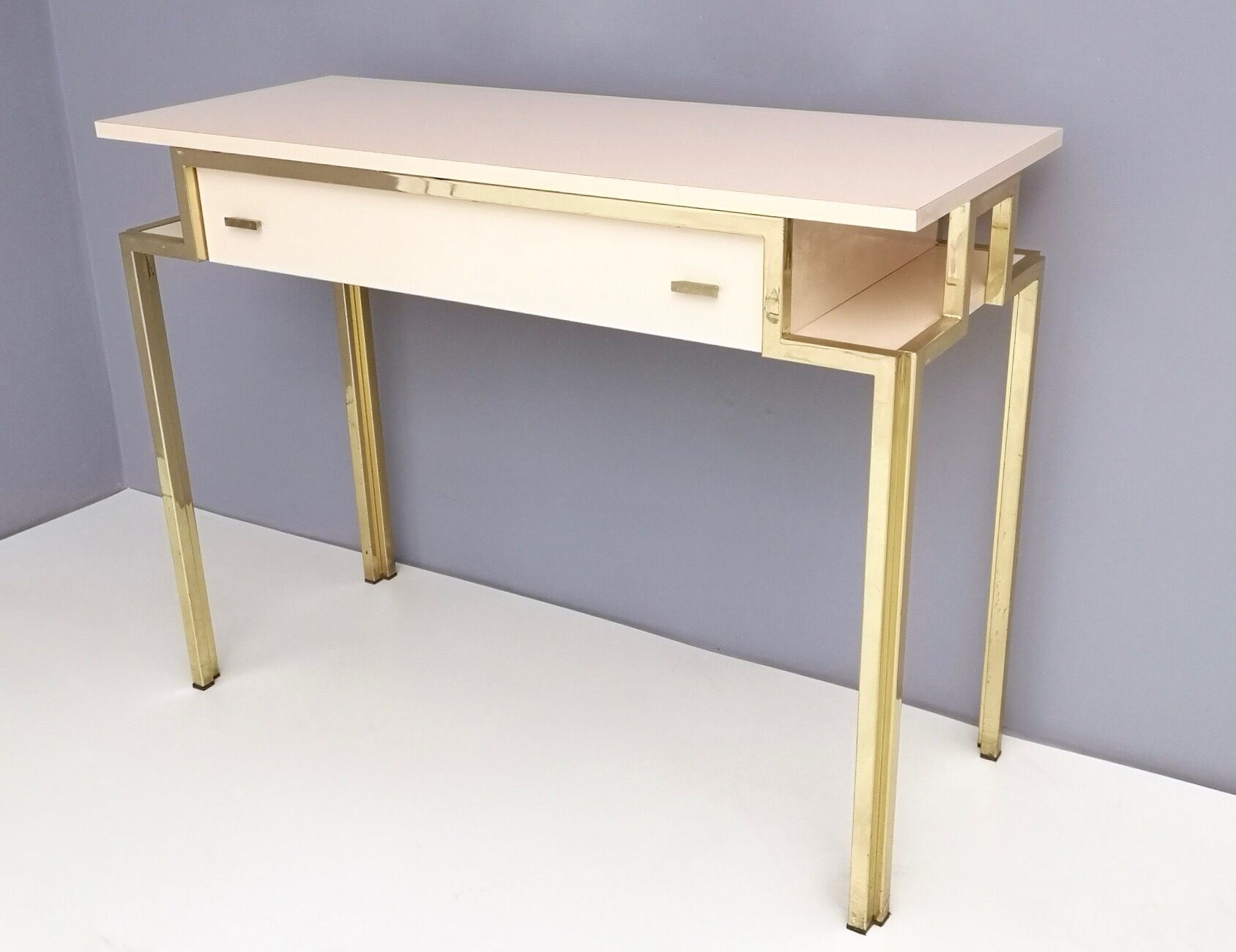 Postmodern pale pink formica and brass console with wall mirror, italy