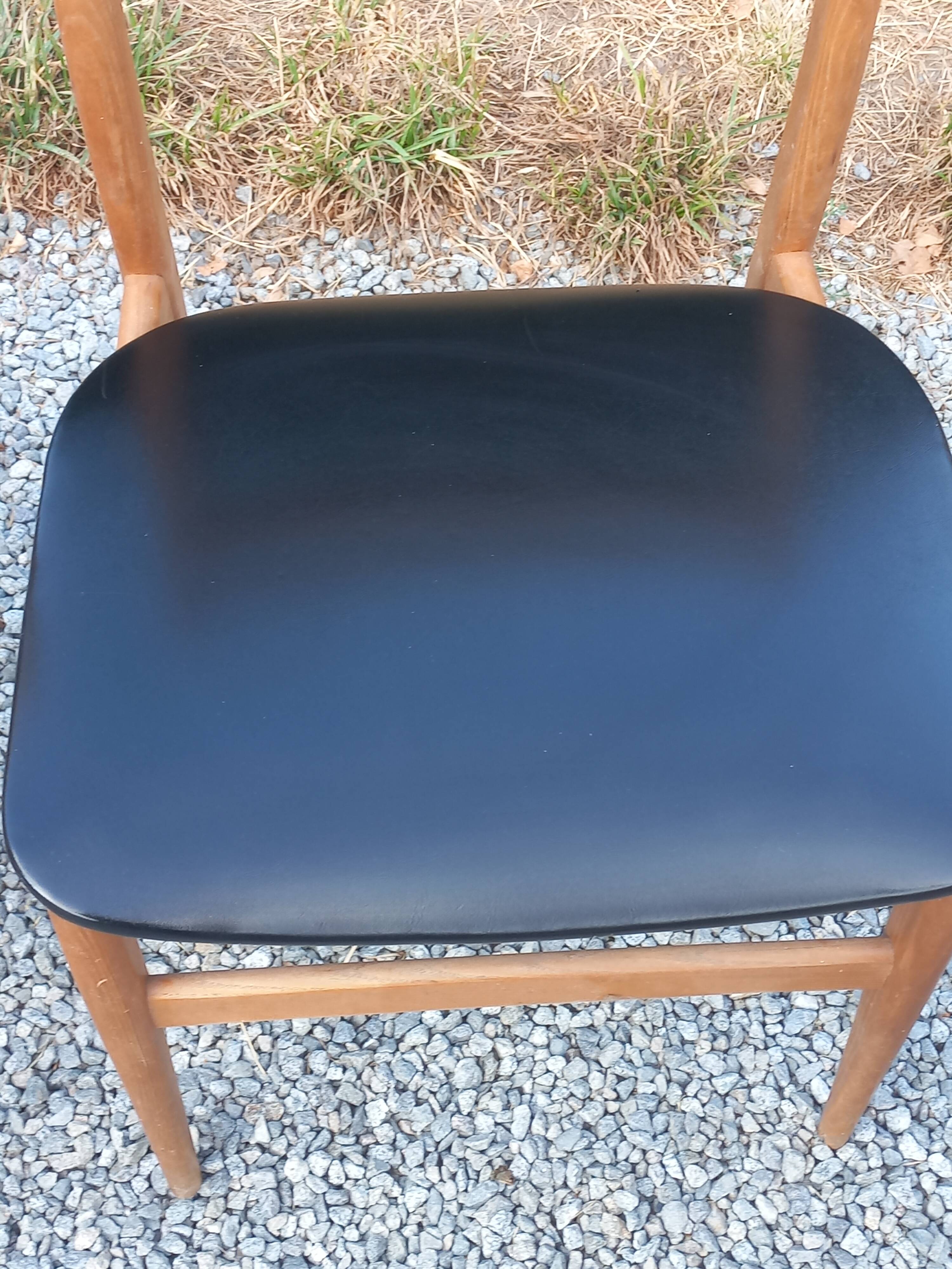 Set of 4 Scandinavian-style teak chairs from the 1970s.