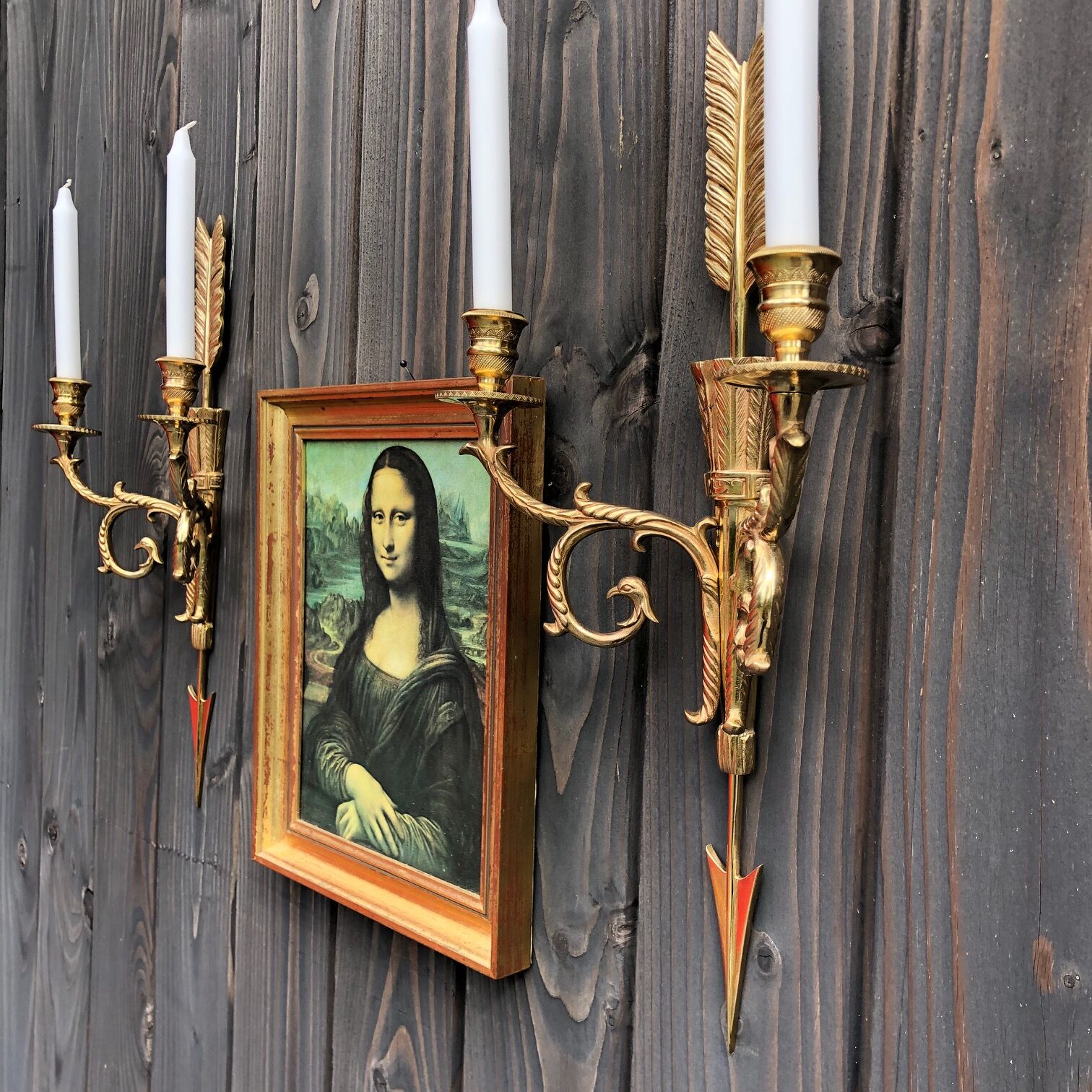 Pair of wall lamps decorated with bronze arrows "Cupid"