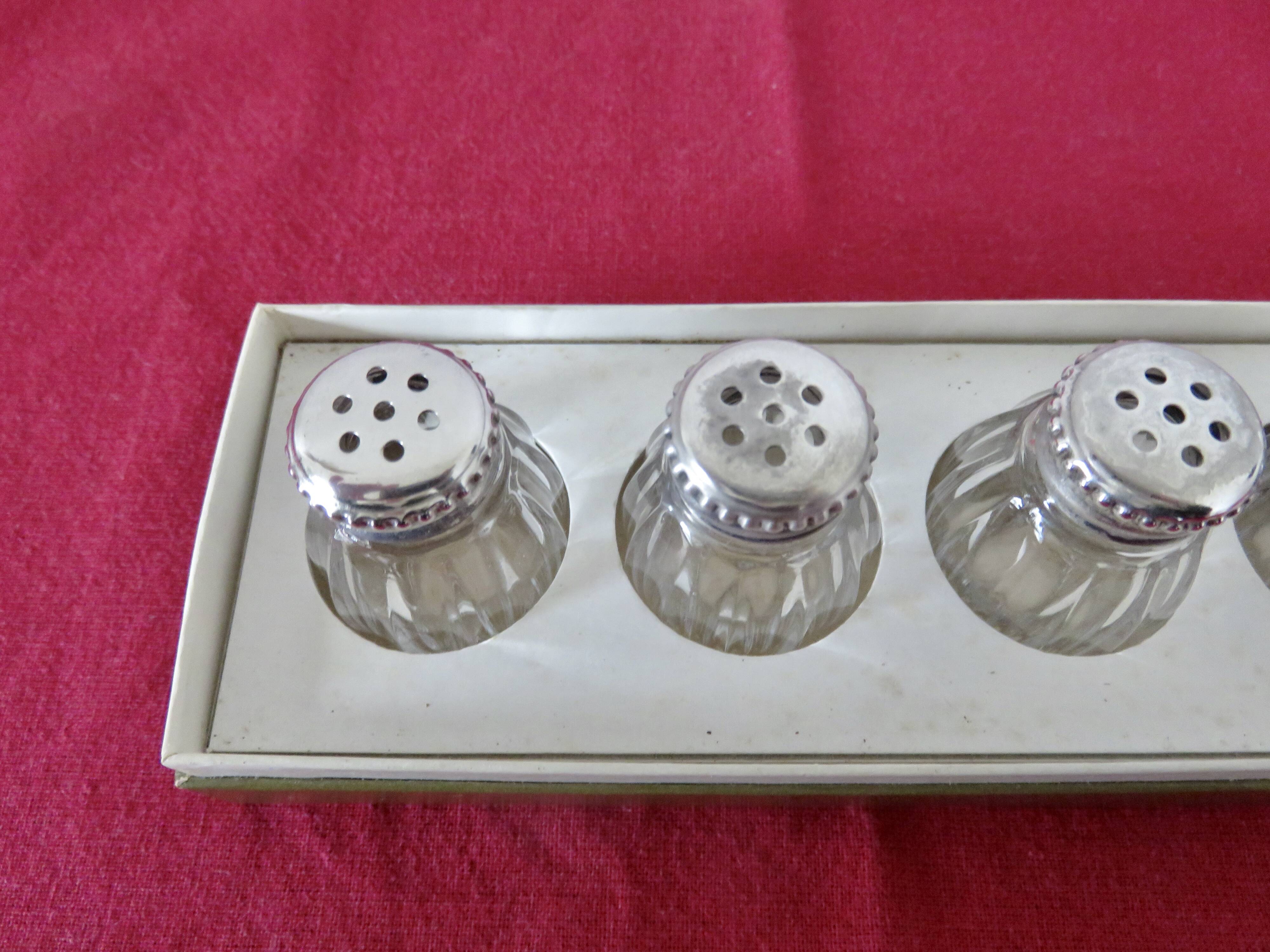 Salt and pepper "CHRISTOFLE" in solid silver in their original box, 1950.