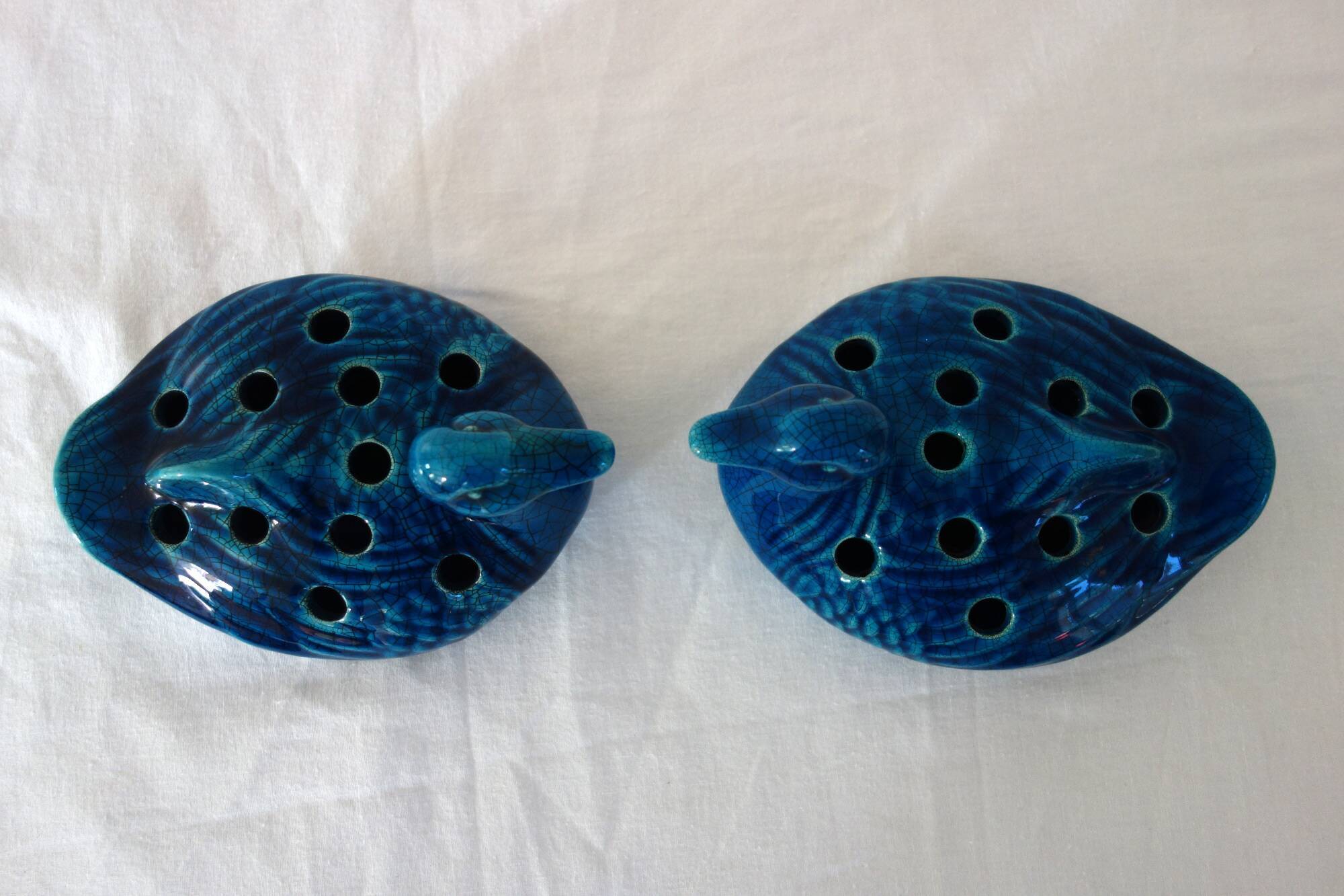 2 blue ceramic duck flower picks