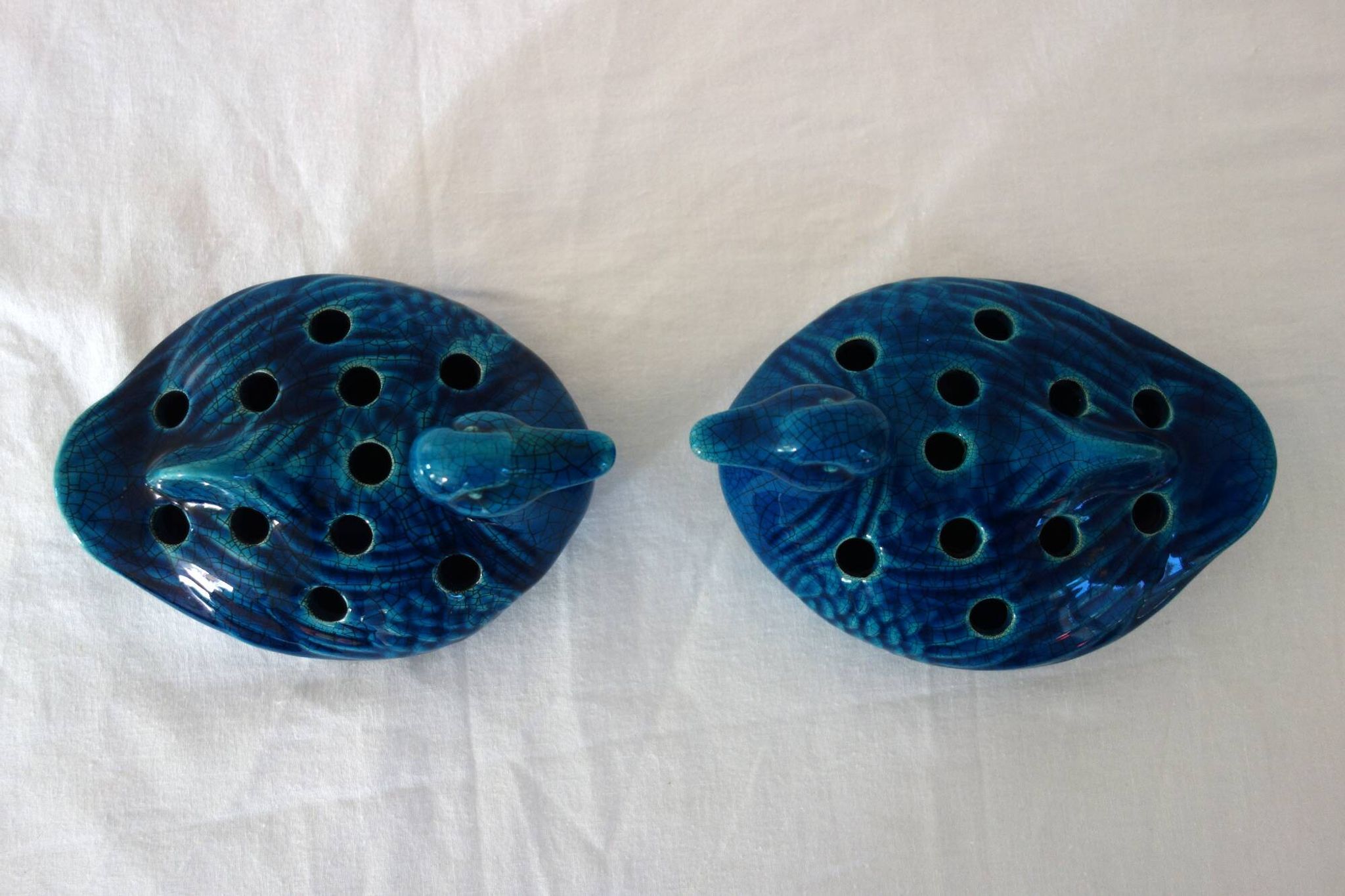 2 blue ceramic duck flower picks