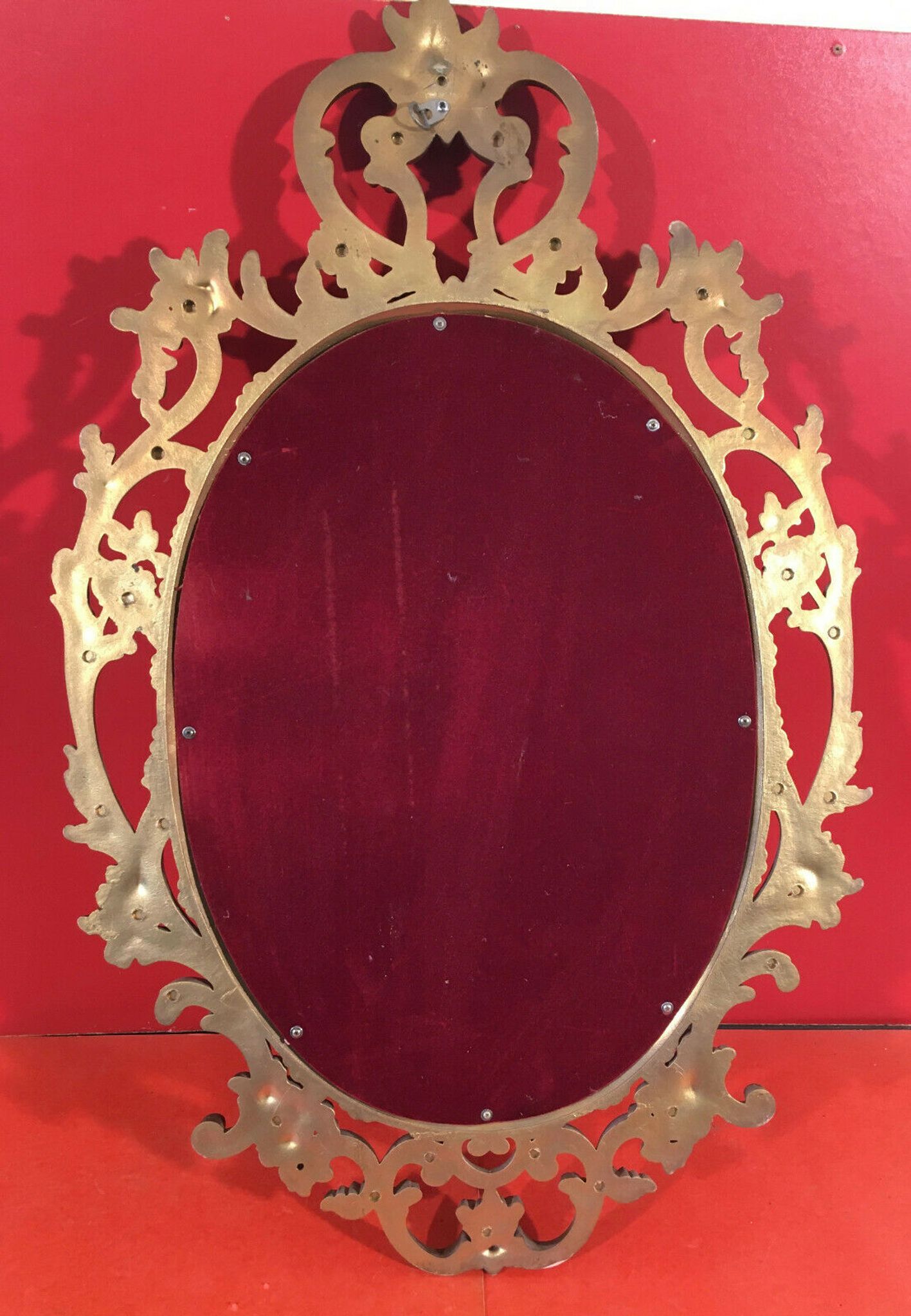 Ancient baroque mirror in gilded resin 83x53cm