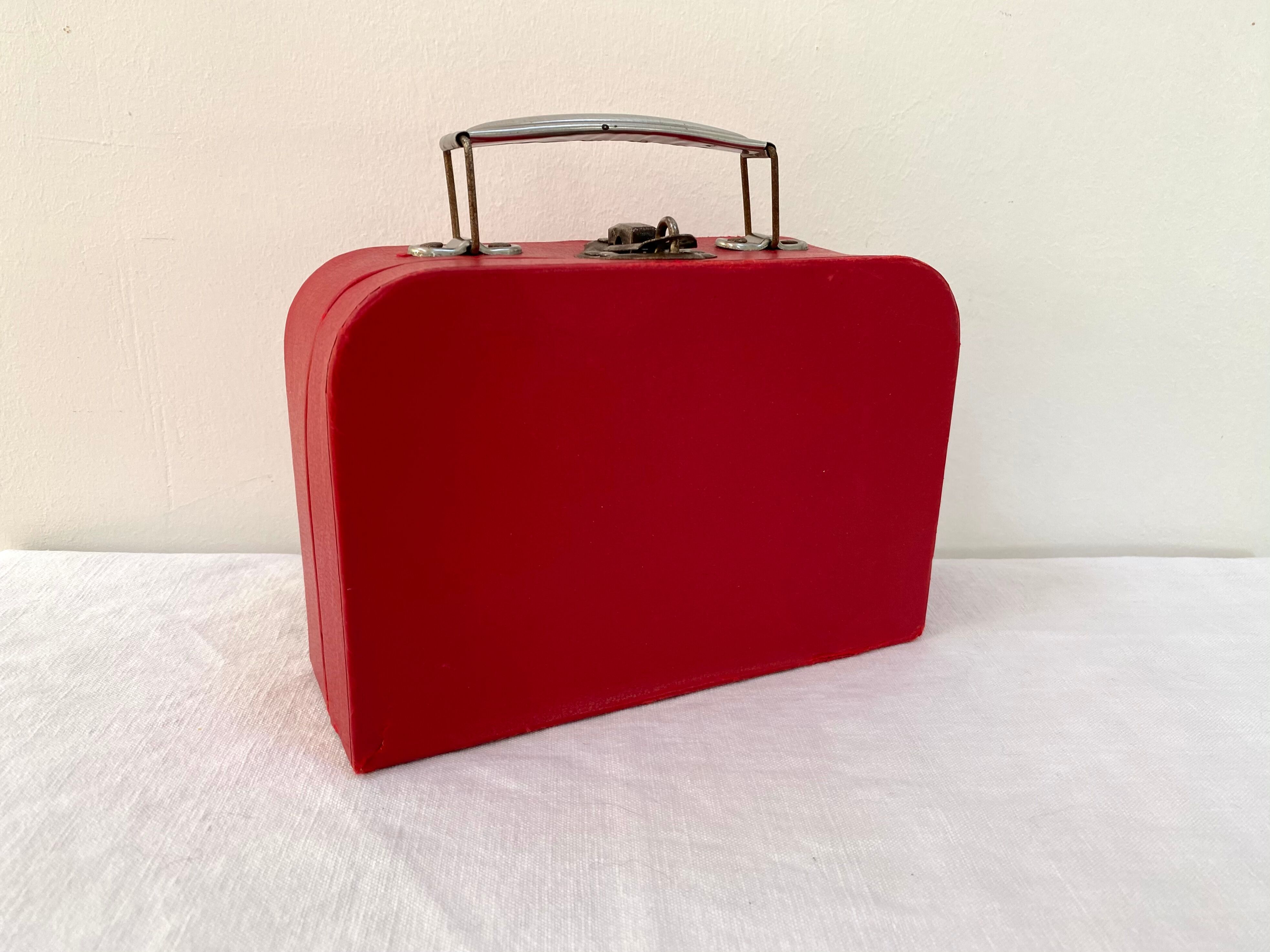 Red suitcase from the 60s