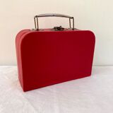 Red suitcase from the 60s