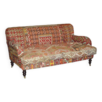 Vintage three-seater canapé by George Smith upholstered in Kilim with feather cushions.