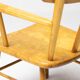 Danish organic armchair in solid birch, curved backrest, 1950s design.