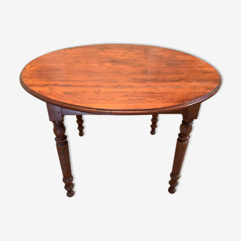 Ancient round table in pine