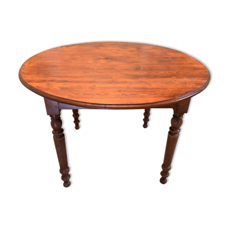 Ancient round table in pine
