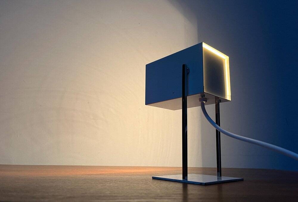 Mid-century minimalist German table lamp in cube by Kaiser Idell Leuchten, 1960s.