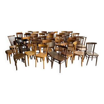 Set of 50 mismatched vintage bistro restaurant chairs