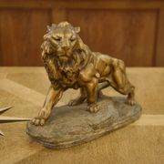 Sculpture of a lion in patinated terracotta by A. Fagotto, 1930s.