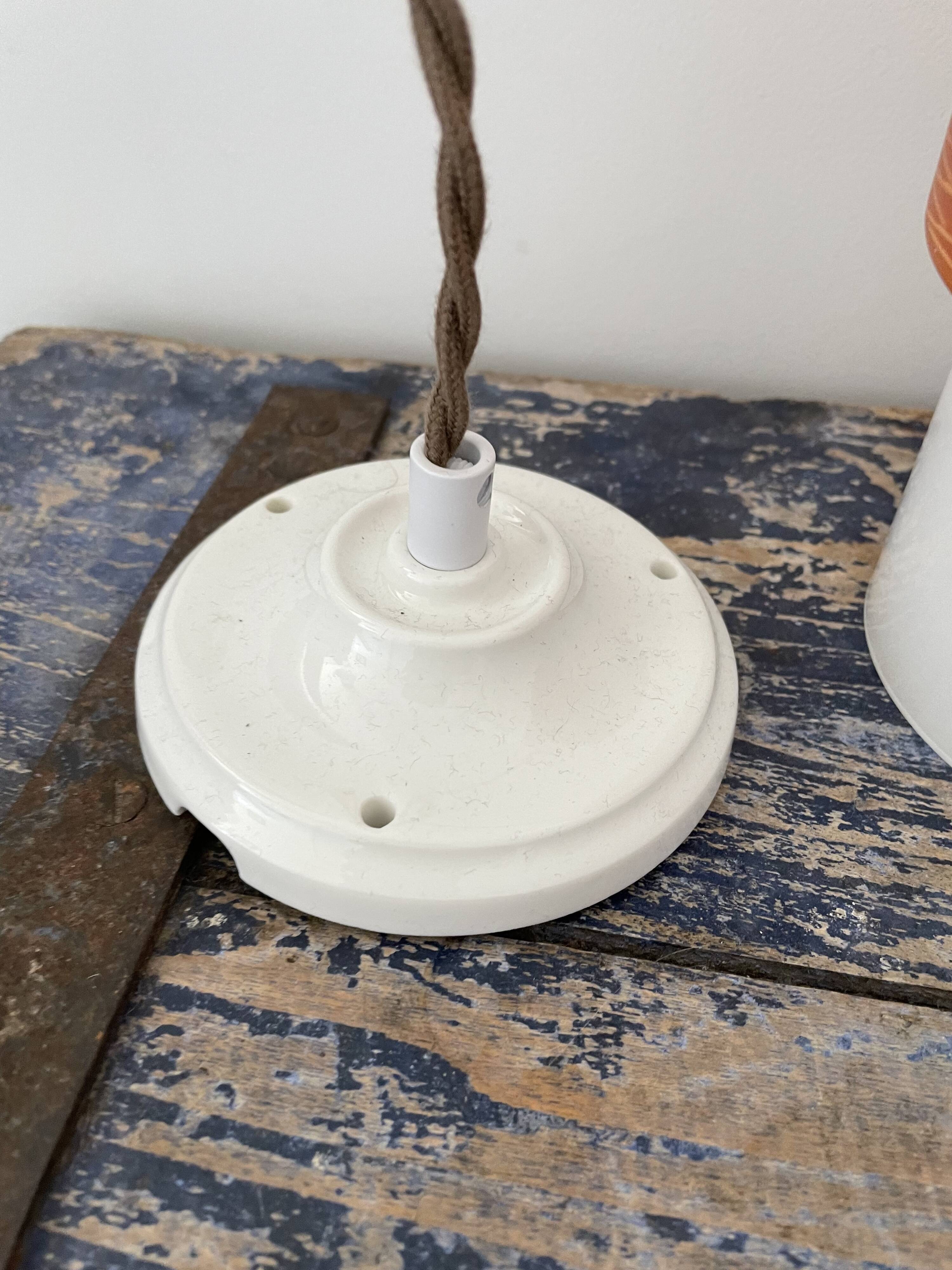 Pair of vintage suspensions electrified to nine