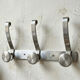 Vintage wall-mounted coat rack in brushed aluminium – minimalist design year