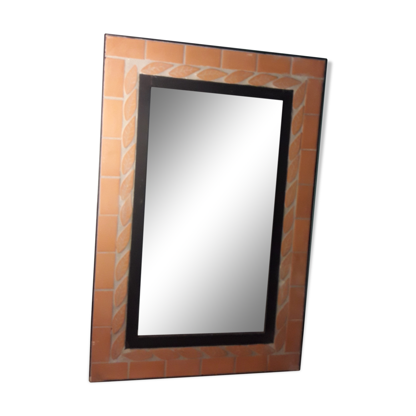 Mirror with terracotta frame