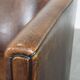 Sheep leather club chair finished with black piping