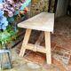 Rustic, raw solid oak bench.