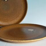 Quatre assiettes de potier en grès émaillé vintages