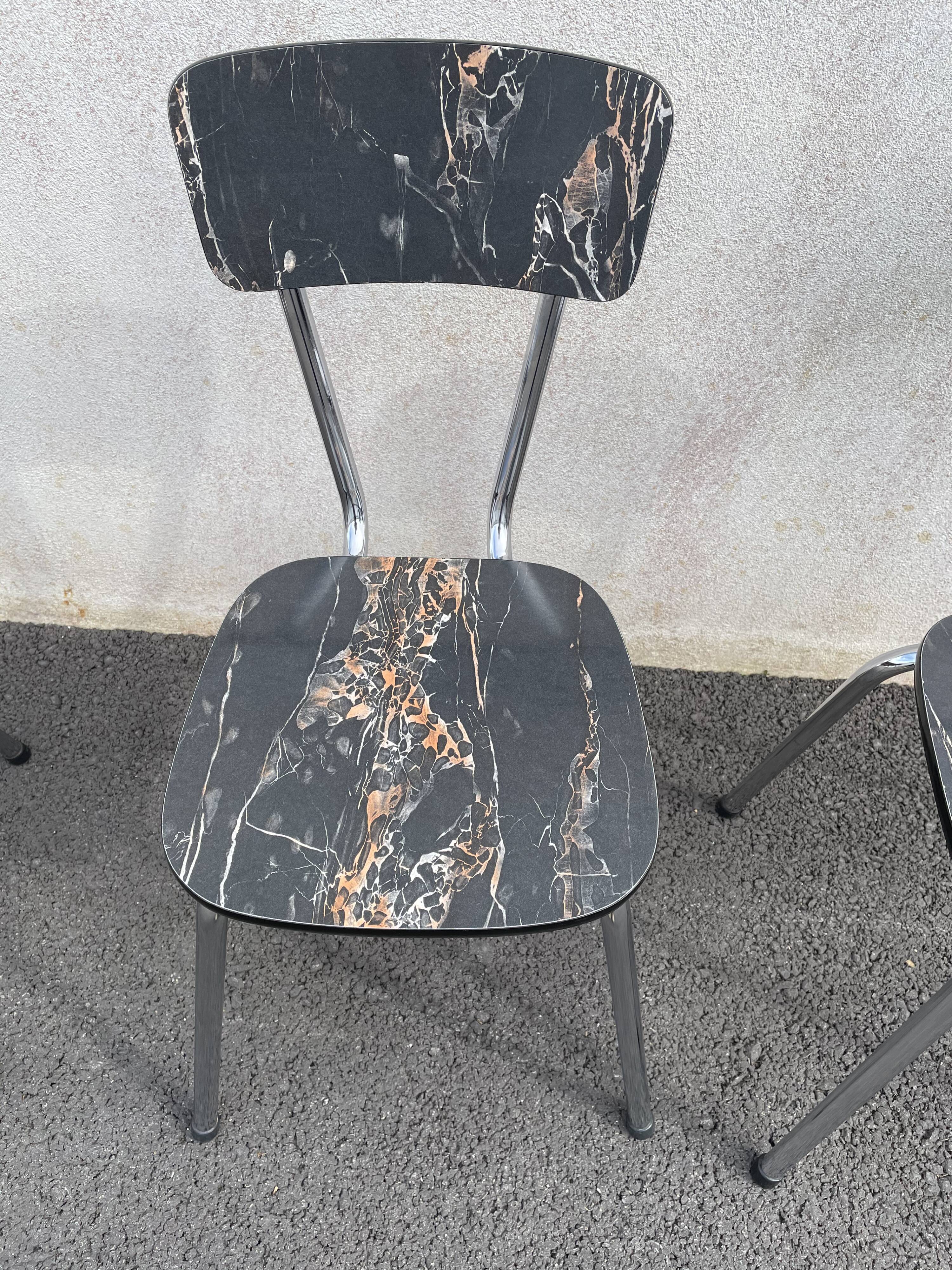 Black marbled formica chairs