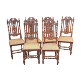 Carved antique chairs with rattan seat