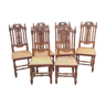 Carved antique chairs with rattan seat