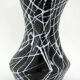 Vase en céramique noire motifs spaghettis blancs, Vallauris France années 50