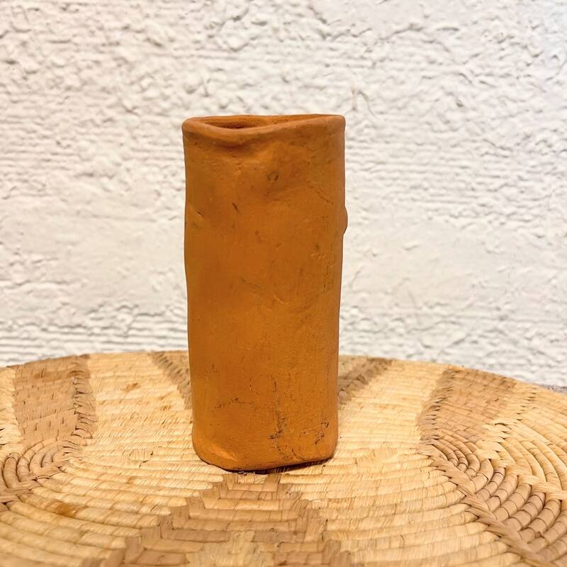Face terracotta vase