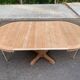 Large extendable round dining table stripped with a central wooden leg 110-198cm.