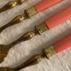 Set of 12 coral and gold dessert forks