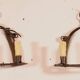 Pair of wrought iron wall sconces in medieval style