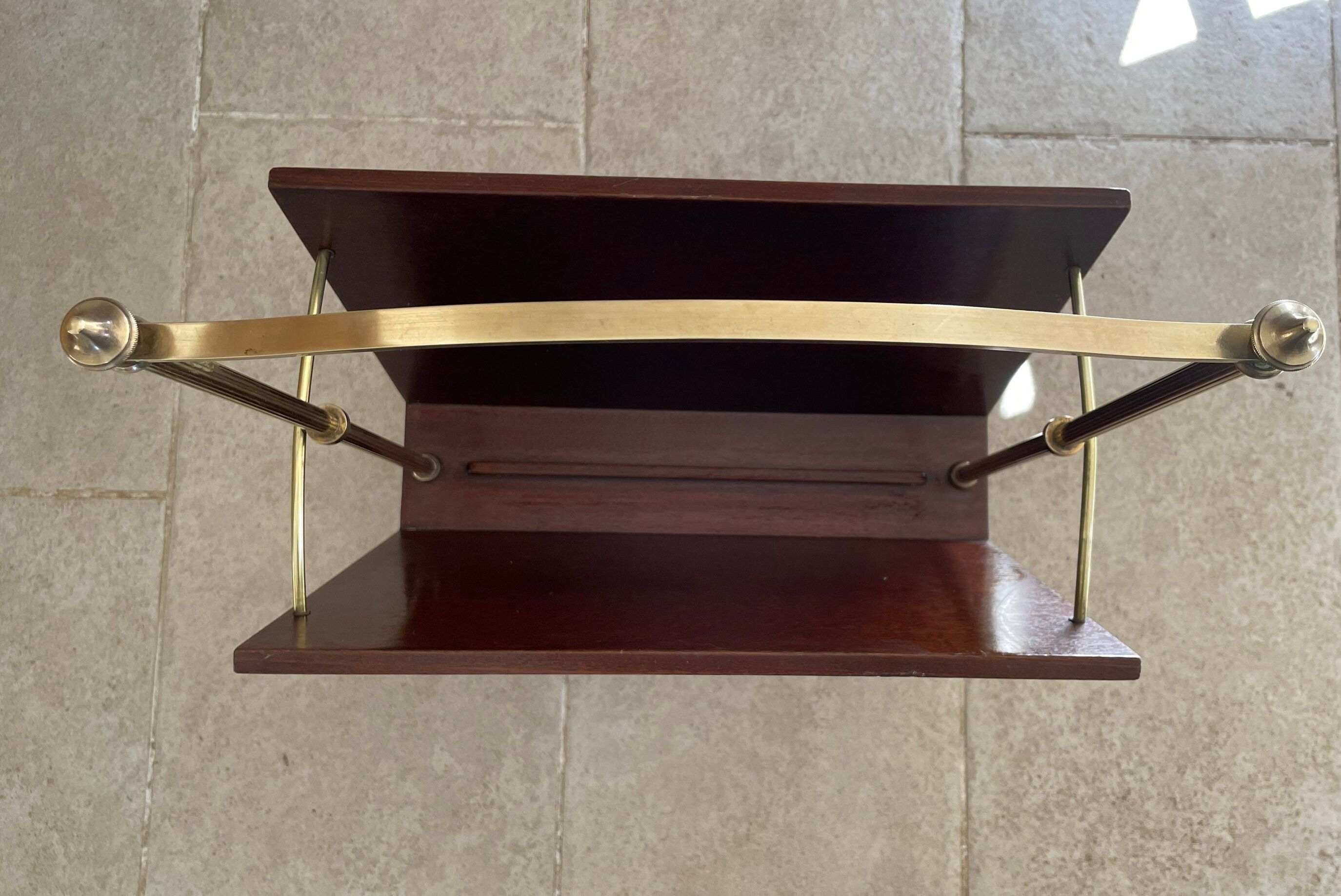 Magazine racks with claw feet by Maison Jansen