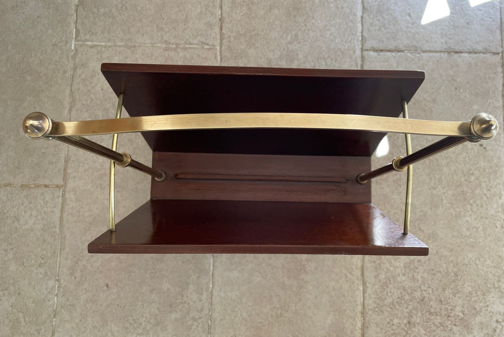 Magazine racks with claw feet by Maison Jansen