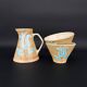 Grès breton peint main – Ensemble floral turquoise Manufacture Bretonne de