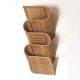 Wall-mounted magazine rack TIBY in rattan wicker by Karl Malmvall for Ikea from the 90s.