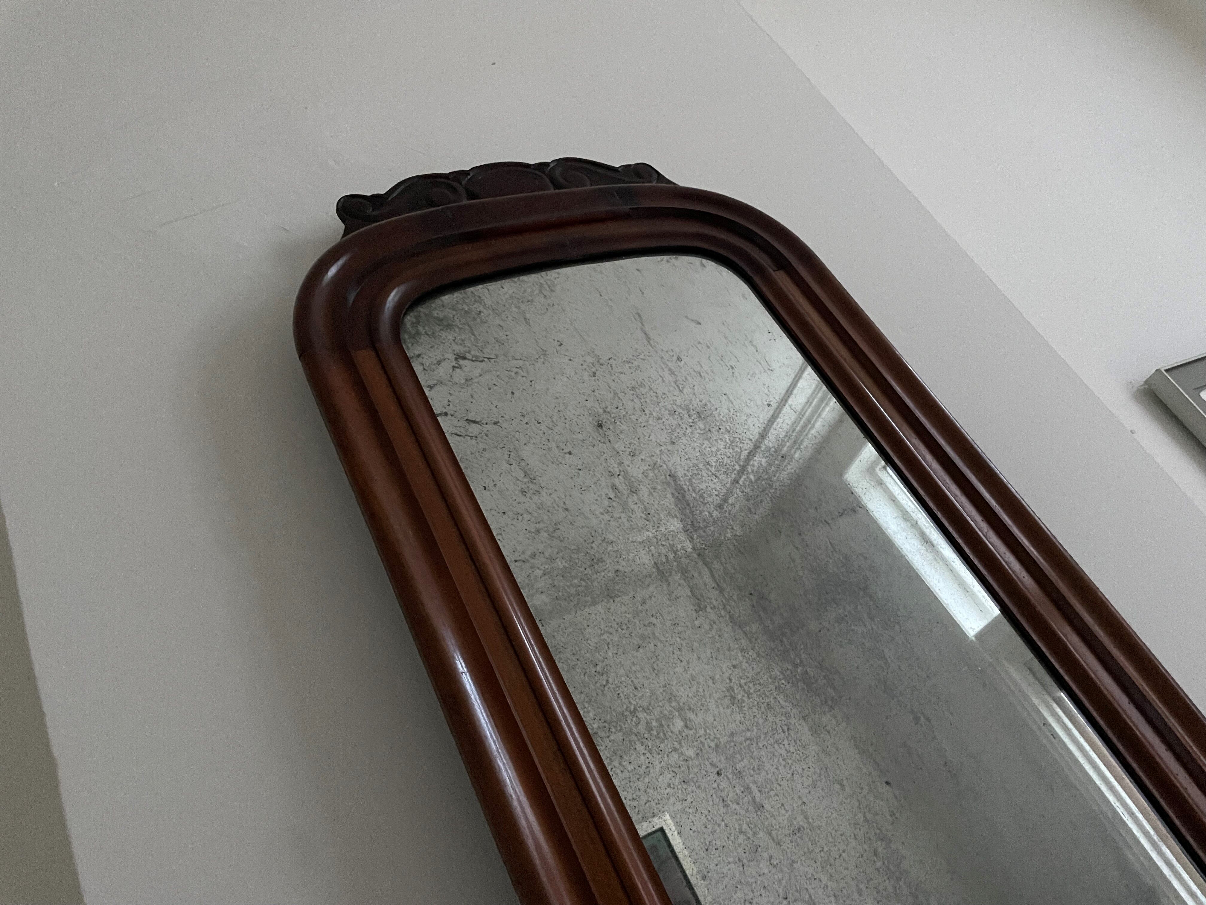 Antique mirror with mahogany frame and silver patinated mirror