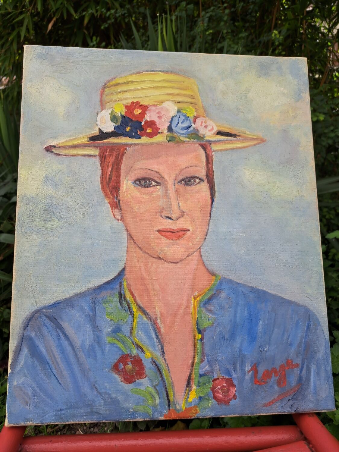 Canvas signed portrait "woman with straw hat"