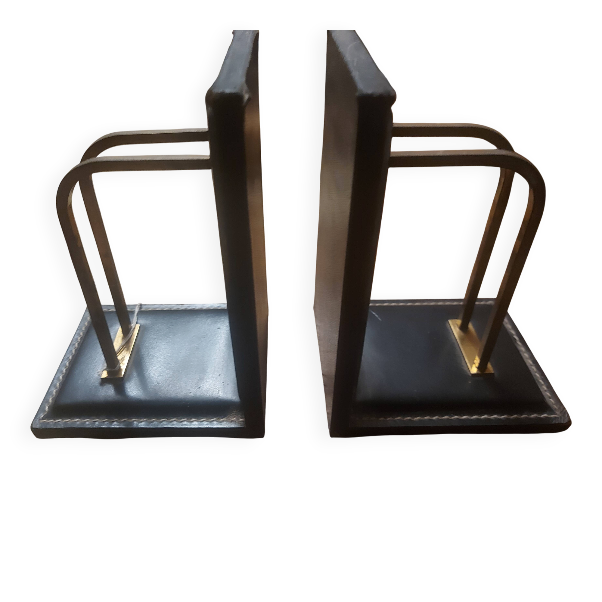 2 modernist leather bookends attributed to Jacques Adnet