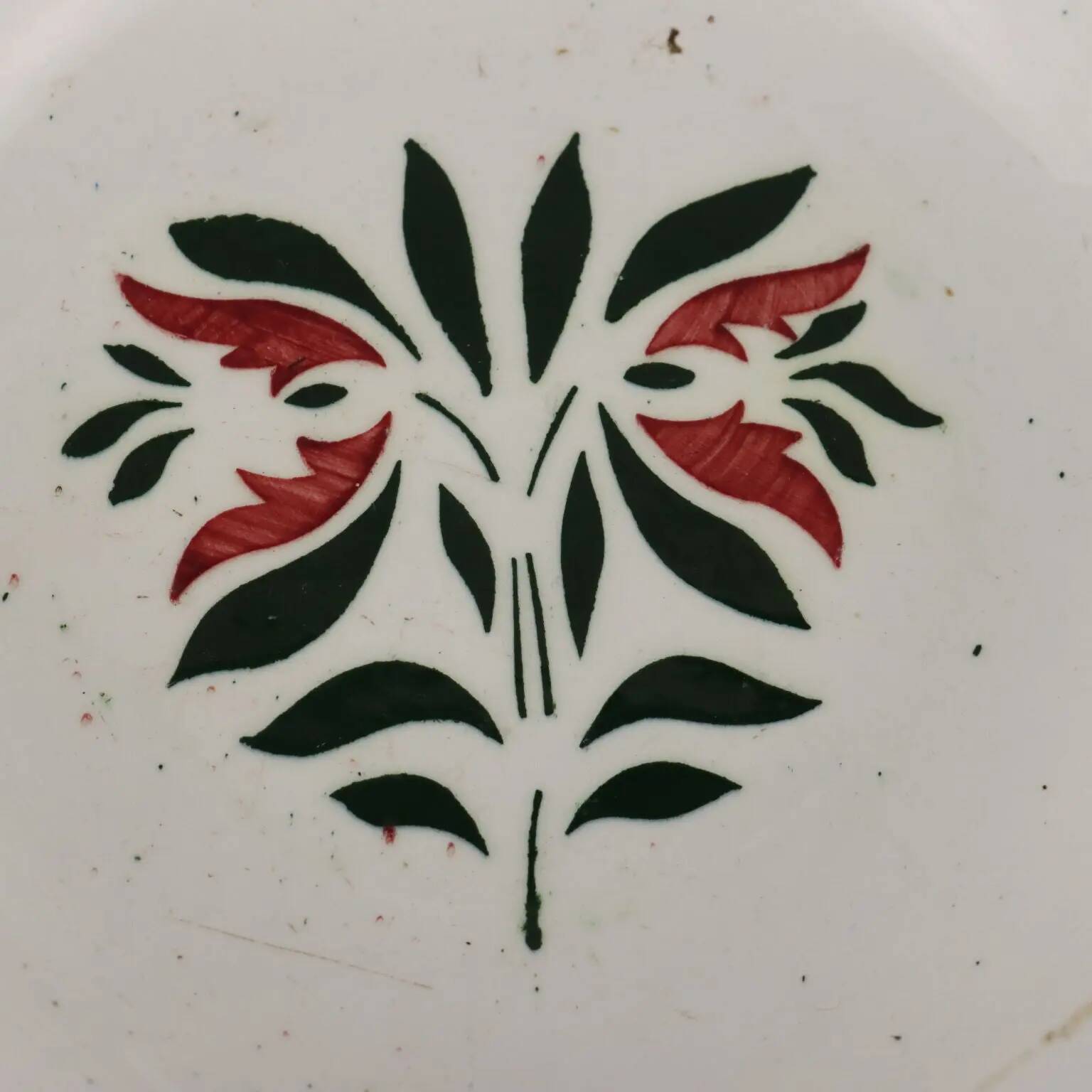 Antique ceramic plate made in France, early 20th century.