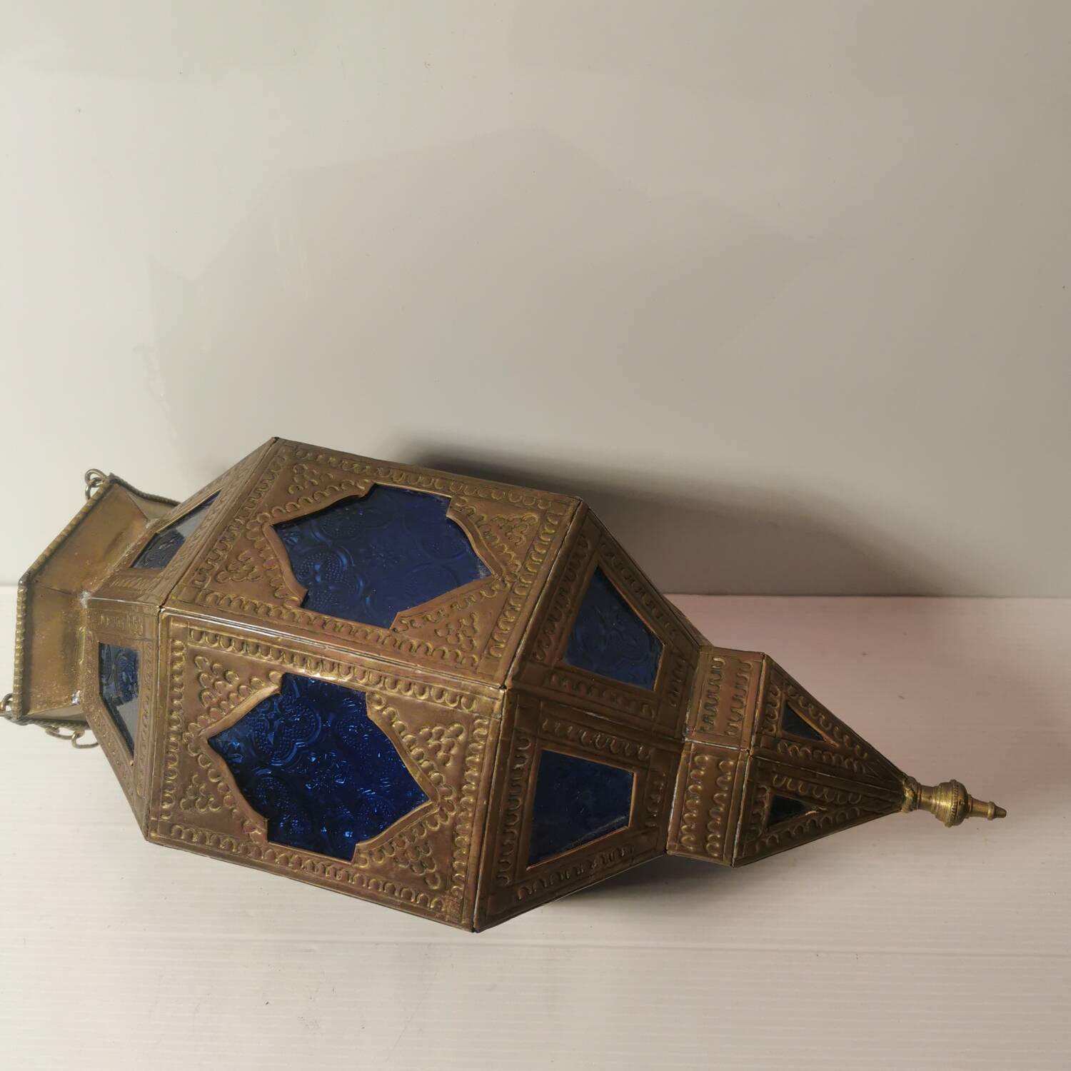 Oriental style hanging lantern in brass and dark blue glass