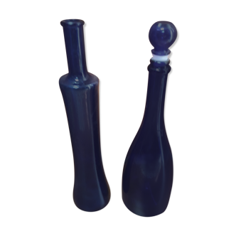 Duo of blue color Klein bottles