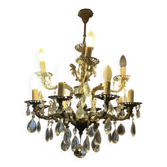 Chandelier with 10 branches and two wall sconces.