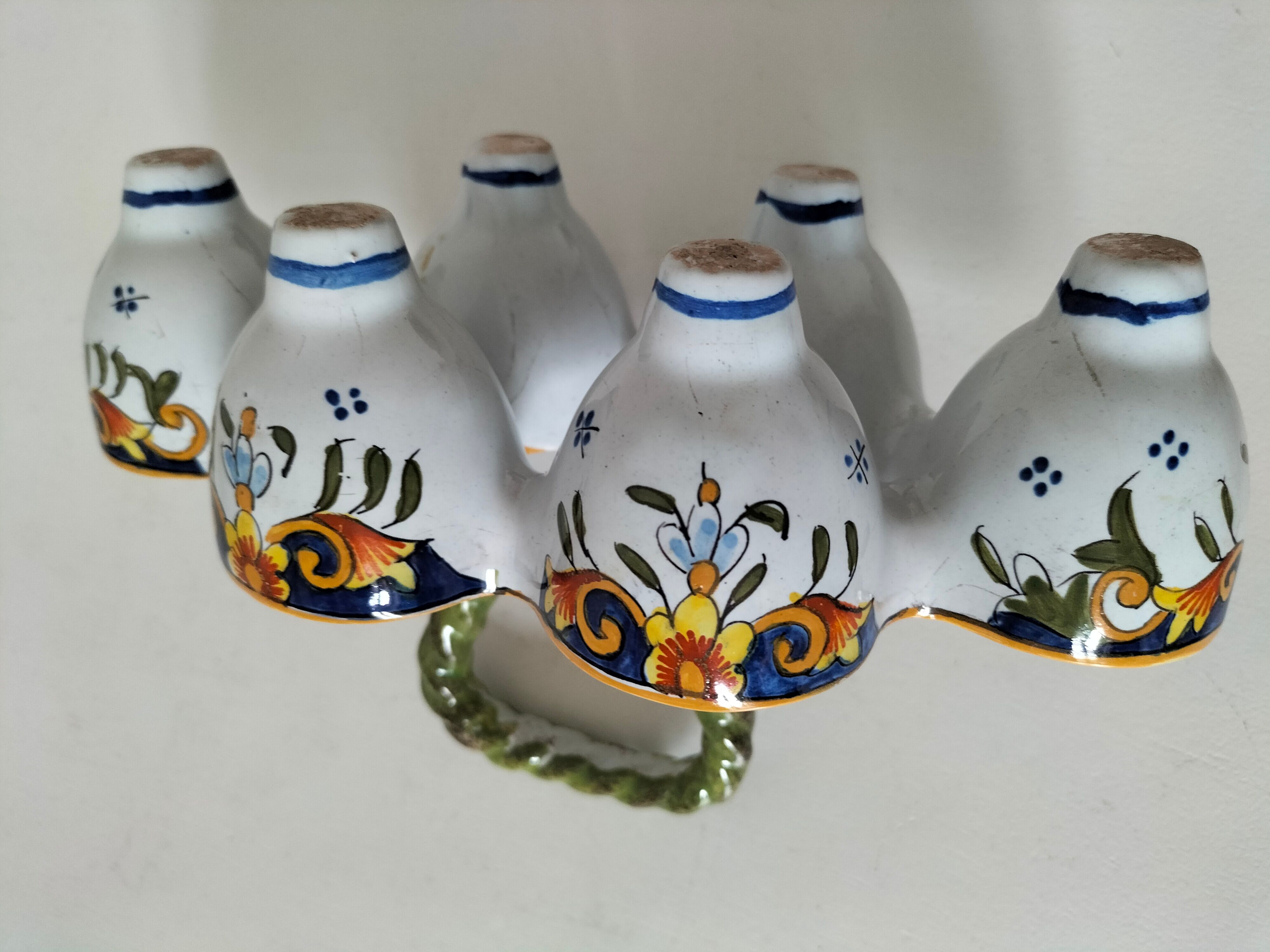 Antique egg holder by Jules Verlingue with polychrome floral decoration.
