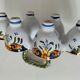 Antique egg holder by Jules Verlingue with polychrome floral decoration.