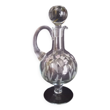 Wine carafe on foot, in cut and enameled glass