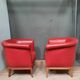 Pair of red leather armchairs