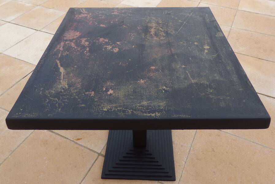 Vintage professional bistro table and its cast iron base