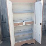 Painted cupboard made of solid wood